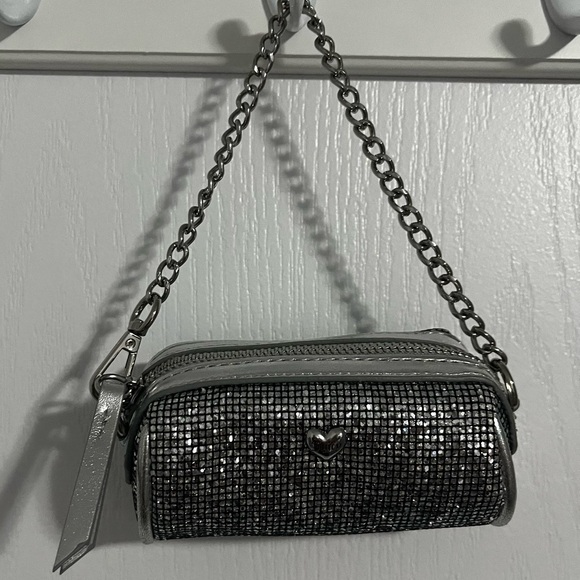 Juicy Couture Handbags - Juicy Couture Silver mini bag with Chain Strap